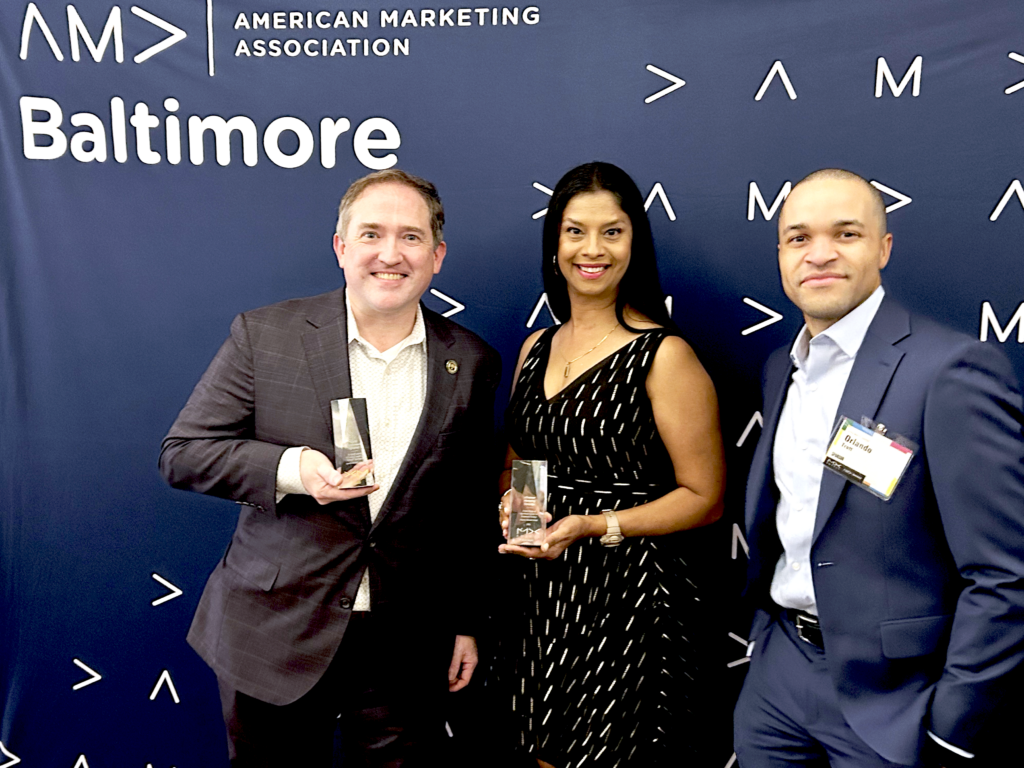 Jim McNulty, Shonali Burke and Orlando Trott pose with the 2 MX Awards Gigawatt Group won with Arena Stage.